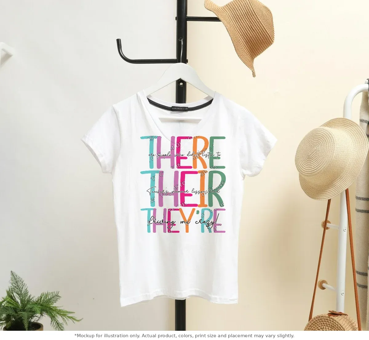 White tee mockup, on a hanger in a styled room