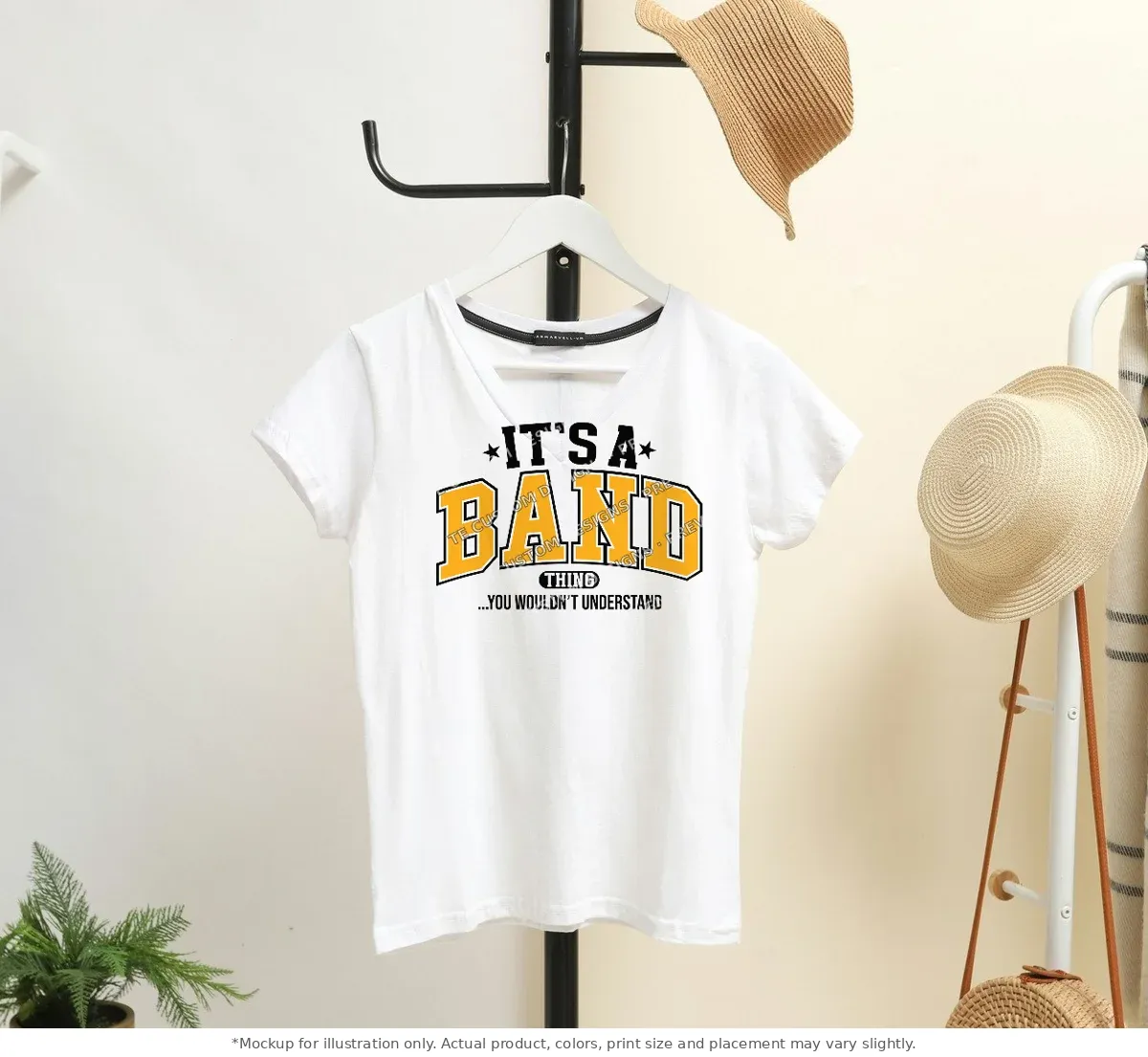 White tee mockup, on a hanger in a styled room