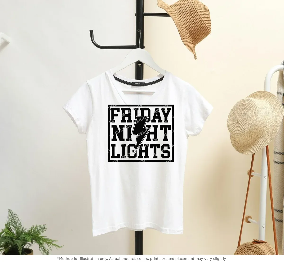 White tee mockup, on a hanger in a styled room