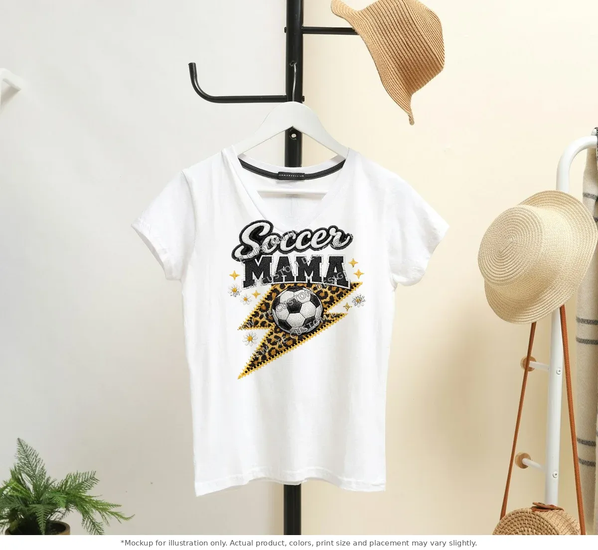 White tee mockup, on a hanger in a styled room
