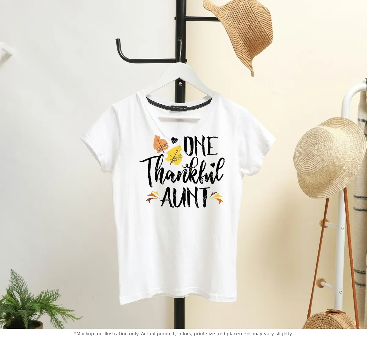 White tee mockup, on a hanger in a styled room
