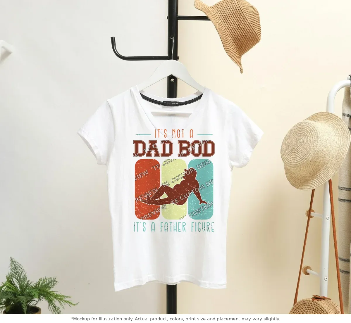White tee mockup, on a hanger in a styled room